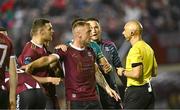 16 September 2024; Stephen Walsh of Galway United in conversation with referee Neil Doyle during the SSE Airtricity Men's Premier Division match between Galway United and Shamrock Rovers at Eamonn Deacy Park in Galway. Photo by Piaras Ó Mídheach/Sportsfile