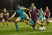 16 September 2024; Stephen Walsh of Galway United in action against Roberto Lopes of Shamrock Rovers during the SSE Airtricity Men's Premier Division match between Galway United and Shamrock Rovers at Eamonn Deacy Park in Galway. Photo by Piaras Ó Mídheach/Sportsfile