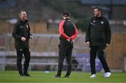 20 September 2024; Drogheda United manager Kevin Doherty, right, with Bohemians first team coach Derek Pender, left, and Bohemians assistant manager Stephen O'Donnell during the SSE Airtricity Men's Premier Division match between Bohemians and Drogheda United at Dalymount Park in Dublin. Photo by Ben McShane/Sportsfile
