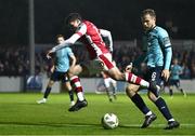 20 September 2024; Kian Leavy of St Patrick's Athletic in action against Rowan McDonald of Waterford during the SSE Airtricity Men's Premier Division match between St Patrick's Athletic and Waterford at Richmond Park in Dublin. Photo by Shauna Clinton/Sportsfile