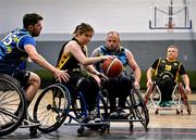 21 September 2024; Valene Ryan of Ballybrack Bulls in action against Sam Jablansky, left, and Turlach Cotter of North East Thunder during the Basketball Ireland Insuremyhouse.ie National Cup quarter-final match between Ballybrack Bulls and North East Thunder at the IWA Gym & Sports Hall in Clontarf, Dublin. The Irish Wheelchair Basketball 24/25 season began with 8 teams from across Ireland contesting the quarter-finals of the InsureMyHouse.ie National Cup and these will be followed by the opening round of the Wheelchair Basketball Junior Blitz on Sunday, featuring young players aged 5-17. Photo by Sam Barnes/Sportsfile