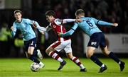 20 September 2024; Kian Leavy of St Patrick's Athletic in action against Rowan McDonald of Waterford during the SSE Airtricity Men's Premier Division match between St Patrick's Athletic and Waterford at Richmond Park in Dublin. Photo by Shauna Clinton/Sportsfile
