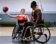 21 September 2024; Oisin O'Connor of Rebel Wheelers Multi-Sport Club in action against Xtremea Ewean of Titans during the Basketball Ireland Insuremyhouse.ie National Cup quarter-final match between Rebel Wheelers Multi-Sport Club and Titans Wheelers at the IWA Gym & Sports Hall in Clontarf, Dublin. The Irish Wheelchair Basketball 24/25 season began with 8 teams from across Ireland contesting the quarter-finals of the InsureMyHouse.ie National Cup and these will be followed by the opening round of the Wheelchair Basketball Junior Blitz on Sunday, featuring young players aged 5-17. Photo by Sam Barnes/Sportsfile