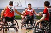 21 September 2024; Adam Drummond of Rebel Wheelers Multi-Sport Club celebrates with team-mates after their side's victory in the Basketball Ireland Insuremyhouse.ie National Cup quarter-final match between Rebel Wheelers Multi-Sport Club and Titans Wheelers at the IWA Gym & Sports Hall in Clontarf, Dublin. The Irish Wheelchair Basketball 24/25 season began with 8 teams from across Ireland contesting the quarter-finals of the InsureMyHouse.ie National Cup and these will be followed by the opening round of the Wheelchair Basketball Junior Blitz on Sunday, featuring young players aged 5-17. Photo by Sam Barnes/Sportsfile