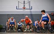21 September 2024; Barry Cooke of Killester in action against Paul Tobin of Clonaslee, right, during the Basketball Ireland Insuremyhouse.ie National Cup quarter-final match between Killester Wheelchair Basketball Club and Clonaslee Wheelchair Basketball Club at the IWA Gym & Sports Hall in Clontarf, Dublin. The Irish Wheelchair Basketball 24/25 season began with 8 teams from across Ireland contesting the quarter-finals of the InsureMyHouse.ie National Cup and these will be followed by the opening round of the Wheelchair Basketball Junior Blitz on Sunday, featuring young players aged 5-17. Photo by Sam Barnes/Sportsfile