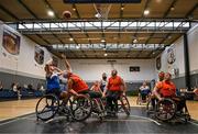 21 September 2024; Conor Dufficy of Clonaslee shoots a basket under pressure from Barry Cooke of Killester during the Basketball Ireland Insuremyhouse.ie National Cup quarter-final match between Killester Wheelchair Basketball Club and Clonaslee Wheelchair Basketball Club at the IWA Gym & Sports Hall in Clontarf, Dublin. The Irish Wheelchair Basketball 24/25 season began with 8 teams from across Ireland contesting the quarter-finals of the InsureMyHouse.ie National Cup and these will be followed by the opening round of the Wheelchair Basketball Junior Blitz on Sunday, featuring young players aged 5-17. Photo by Sam Barnes/Sportsfile