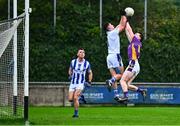 21 September 2024; Ballyboden St Endas goalkeeper Hugh O'Sullivan and Dara Mullin of Kilmacud Crokes collide during the Dublin County Senior 1 Club Football Championship quarter-final match between Kilmacud Crokes and Ballyboden St Endas at Parnell Park in Dublin. Photo by Shauna Clinton/Sportsfile