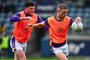 21 September 2024; Paul Mannion, right, and Tom Fox of Kilmacud Crokes warm up before the Dublin County Senior 1 Club Football Championship quarter-final match between Kilmacud Crokes and Ballyboden St Endas at Parnell Park in Dublin. Photo by Shauna Clinton/Sportsfile
