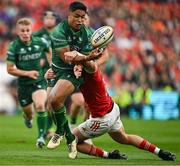 21 September 2024; Josh Ioane of Connacht is tackled by Mike Haley of Munster during the United Rugby Championship match between Munster and Connacht at Thomond Park in Limerick. Photo by Brendan Moran/Sportsfile