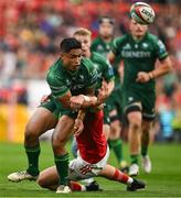 21 September 2024; Josh Ioane of Connacht is tackled by Mike Haley of Munster during the United Rugby Championship match between Munster and Connacht at Thomond Park in Limerick. Photo by Brendan Moran/Sportsfile