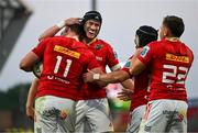 21 September 2024; Mike Haley congratulates teammate Shane Daly of Munster, 11, after scoring their side's fifth try during the United Rugby Championship match between Munster and Connacht at Thomond Park in Limerick. Photo by Brendan Moran/Sportsfile
