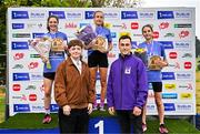 22 September 2024; Women's top 3 finishers, from left, second place Caitlyn Harvey of Road Runners AC, Antrim, first place Michelle Finn of Leevale AC, Cork, and third place Fiona Stack, with Patrick Ryan, Managing Director of Irish Life Advice Solutions, right, and Mark Winters, designer of the Irish Life Dublin Half Marathon medal presenting medals to the finishers.  A talented student and artist from NCAD he created an intricately designed medal featuring the diverse wildlife of Phoenix Park. The standout feature of the medal is a beautiful depiction of a majestic deer, which is a symbol of Phoenix Park during the 2024 Irish Life Dublin Half Marathon which took place on Sunday 22nd of September in Phoenix Park, Dublin. Photo by Sam Barnes/Sportsfile