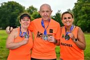 22 September 2024; Participants of Cherry Orchard Running AC, Dublin, from left, Mary Power, Lee Power and Rachel Nolan after finishing the 2024 Irish Life Dublin Half Marathon which took place on Sunday 22nd of September in Phoenix Park, Dublin. Photo by Sam Barnes/Sportsfile