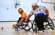 22 September 2024; Paul Hannon of Ulster in action against Shane Curran of Connacht during the 2024 M. Donnelly GAA Wheelchair Hurling / Camogie All-Ireland Finals match between Ulster and Connacht at SETU Carlow Campus Sports Hall in Carlow. Photo by Shauna Clinton/Sportsfile