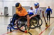 22 September 2024; Paul Hannon of Ulster in action against John Blake of Connacht during the 2024 M. Donnelly GAA Wheelchair Hurling / Camogie All-Ireland Finals match between Ulster and Connacht at SETU Carlow Campus Sports Hall in Carlow. Photo by Shauna Clinton/Sportsfile