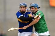 22 September 2024; Evan Fitzgerald of Patrickswell is tackled by Aaron Costello of Kilmallock during the Limerick County Senior Club Hurling Championship Group 1 match between Patrickswell and Kilmallock at Mick Neville Park in Rathkeale, Limerick. Photo by Tom Beary/Sportsfile