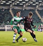 23 September 2024; Paddy Kirk of Bohemians in action against Darragh Burns of Shamrock Rovers during the SSE Airtricity Men's Premier Division match between Shamrock Rovers and Bohemians at Tallaght Stadium in Dublin. Photo by Piaras Ó Mídheach/Sportsfile