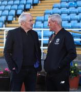 27 September 2024; Galway United manager John Caulfield, left, in conversation with Waterford head coach Keith Long before the SSE Airtricity Men's Premier Division match between Waterford and Galway United at the Regional Sports Centre in Waterford. Photo by Michael P Ryan/Sportsfile