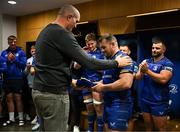 27 September 2024; Cian Healy of Leinster is presented with a special cap by previous cap record holder Devin Toner, right, after the United Rugby Championship match between Leinster and Dragons at the Aviva Stadium in Dublin. Photo by Brendan Moran/Sportsfile