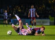 27 September 2024; Colm Whelan of Derry City in action against James Bolger of Drogheda United during the SSE Airtricity Men's Premier Division match between Drogheda United and Derry City at Weavers Park in Drogheda, Louth. Photo by Stephen McCarthy/Sportsfile