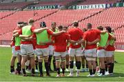 28 September 2024; Ulster players in a huddle before the United Rugby Championship match between Emirates Lions and Ulster at Emirates Airline Park in Johannesburg, South Africa. Photo by Shaun Roy/Sportsfile