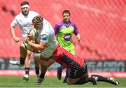 28 September 2024; Matty Rea of Ulster is tackled by Jarod Cairns of Emirates Lions during the United Rugby Championship match between Emirates Lions and Ulster at Emirates Airline Park in Johannesburg, South Africa. Photo by Shaun Roy/Sportsfile