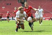 28 September 2024; Werner Kok of Ulster and Kade Wolhuter of Emirates Lions challenge for the loose ball during the United Rugby Championship match between Emirates Lions and Ulster at Emirates Airline Park in Johannesburg, South Africa. Photo by Shaun Roy/Sportsfile