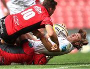 28 September 2024; Aidan Morgan of Ulster is tackled short of the try line during the United Rugby Championship match between Emirates Lions and Ulster at Emirates Airline Park in Johannesburg, South Africa. Photo by Shaun Roy/Sportsfile