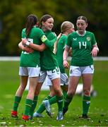 28 September 2024; Ava Mullins of Republic of Ireland, centre, celebrates with team-mates after scoring her side's first goal during the women's U17 international friendly match between Republic of Ireland and Cymru at the AUL Complex in Clonsaugh, Dublin. Photo by Shauna Clinton/Sportsfile