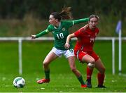 28 September 2024; Ella Kelly of Republic of Ireland in action against Lily Nicholls of Cymru during the women's U17 international friendly match between Republic of Ireland and Cymru at the AUL Complex in Clonsaugh, Dublin. Photo by Shauna Clinton/Sportsfile