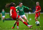 28 September 2024; Ella Kelly of Republic of Ireland in action against Mia Davies of Cymru during the women's U17 international friendly match between Republic of Ireland and Cymru at the AUL Complex in Clonsaugh, Dublin. Photo by Shauna Clinton/Sportsfile