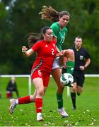 28 September 2024; Mia Davies of Cymru in action against Mary Hartofolis of Republic of Ireland during the women's U17 international friendly match between Republic of Ireland and Cymru at the AUL Complex in Clonsaugh, Dublin. Photo by Shauna Clinton/Sportsfile