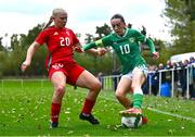 28 September 2024; Ella Kelly of Republic of Ireland in action against Emily Ingram of Cymru during the women's U17 international friendly match between Republic of Ireland and Cymru at the AUL Complex in Clonsaugh, Dublin.