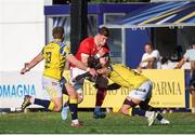 28 September 2024;  Jack O’Donoghue of Munster in action against Luca Morisi of Zebre Parma during the United Rugby Championship match between Zebre Parma and Munster at Stadio Sergio Lanfranchi in Parma, Italy. Photo by Roberto Bregani/Sportsfile