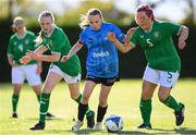 27 September 2024; Karen Gunnarsdottir of Denmark with Aíne Monk, 5, and Casey Keaney of Ireland during the cerebal palsy women's international series match between Ireland and Denmark at the AUL Complex in Dublin. Photo by Stephen McCarthy/Sportsfile