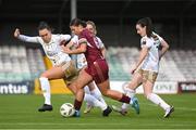 28 September 2024; Jenna Slattery of Galway United in action against Shelbourne players, from left, Jess Gargan, Maggie Pierce and Roma McLaughlin during the SSE Airtricity Women's Premier Division match between Galway United and Shelbourne at Eamonn Deacy Park in Galway. Photo by Stephen McCarthy/Sportsfile