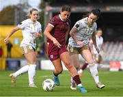 28 September 2024; Jenna Slattery of Galway United in action against Shelbourne's Roma McLaughlin, right, and Maggie Pierce during the SSE Airtricity Women's Premier Division match between Galway United and Shelbourne at Eamonn Deacy Park in Galway. Photo by Stephen McCarthy/Sportsfile