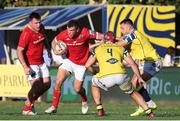 28 September 2024; Tom Farrell of Munster in action against Matteo Canali of Zebre Parma during the United Rugby Championship match between Zebre Parma and Munster at Stadio Sergio Lanfranchi in Parma, Italy. Photo by Roberto Bregani/Sportsfile