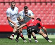 28 September 2024; Sean Reffell of Ulster attempts to get past Morgan Naude of Emirates Lions during the United Rugby Championship match between Emirates Lions and Ulster at Emirates Airline Park in Johannesburg, South Africa. Photo by Shaun Roy/Sportsfile