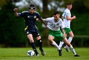 28 September 2024; Jon McFarlane of Scotland in action against Dylan Sheridan of Ireland during the Cerebal Palsy men's international series match between Ireland and Scotland at the AUL Complex in Dublin. Photo by Shauna Clinton/Sportsfile