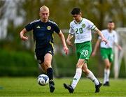 28 September 2024; James Bateman of Ireland in action against Logan Smith of Scotland during the Cerebal Palsy men's international series match between Ireland and Scotland at the AUL Complex in Dublin. Photo by Shauna Clinton/Sportsfile