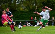 28 September 2024; Charlie Byrne of Ireland has a shot on goal blocked by Scotland goalkeeper Chris Moore during the Cerebal Palsy men's international series match between Ireland and Scotland at the AUL Complex in Dublin. Photo by Shauna Clinton/Sportsfile