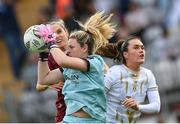 28 September 2024; Shelbourne goalkeeper Amanda McQuillan and Jess Gargan, right, in action against Julie-Ann Russell of Galway United during the SSE Airtricity Women's Premier Division match between Galway United and Shelbourne at Eamonn Deacy Park in Galway. Photo by Stephen McCarthy/Sportsfile