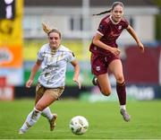 28 September 2024; Kate Thompson of Galway United in action against Maggie Pierce of Shelbourne during the SSE Airtricity Women's Premier Division match between Galway United and Shelbourne at Eamonn Deacy Park in Galway. Photo by Stephen McCarthy/Sportsfile