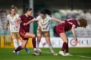 28 September 2024; Roma McLaughlin with the support of her Shelbourne team-mate Kate Mooney, left, in action against Kate Thompson, left, and Therese Kinnevey of Galway United during the SSE Airtricity Women's Premier Division match between Galway United and Shelbourne at Eamonn Deacy Park in Galway. Photo by Stephen McCarthy/Sportsfile