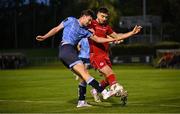 28 September 2024; Colin Bolton of UCD in action against Conor Cannon of Sligo Rovers during the EA SPORTS MU20 League of Ireland Enda McGuill Cup final match between UCD and Sligo Rovers at UCD Bowl in Belfield, Dublin. Photo by David Fitzgerald/Sportsfile
