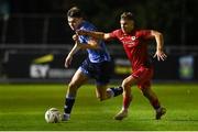 28 September 2024; Colin Bolton of UCD in action against Michael Clifford of Sligo Rovers during the EA SPORTS MU20 League of Ireland Enda McGuill Cup final match between UCD and Sligo Rovers at UCD Bowl in Belfield, Dublin. Photo by David Fitzgerald/Sportsfile