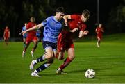 28 September 2024; Colin Bolton of UCD in action against Gareth McElroy of Sligo Rovers during the EA SPORTS MU20 League of Ireland Enda McGuill Cup final match between UCD and Sligo Rovers at UCD Bowl in Belfield, Dublin. Photo by David Fitzgerald/Sportsfile