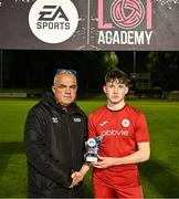 28 September 2024; Man of the match Thomas Morley of Sligo Rovers is presented with the award by Pat Duffy after the EA SPORTS MU20 League of Ireland Enda McGuill Cup final match between UCD and Sligo Rovers at UCD Bowl in Belfield, Dublin. Photo by David Fitzgerald/Sportsfile