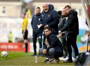 28 September 2024; Galway United manager Phil Trill, crouching, and assistant manager Adrian Cronin during the SSE Airtricity Women's Premier Division match between Galway United and Shelbourne at Eamonn Deacy Park in Galway. Photo by Stephen McCarthy/Sportsfile